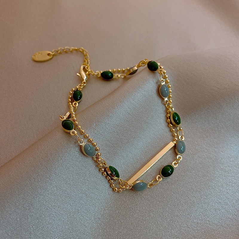 Pulsera Dorada De Epoxi Con Brillo Verde