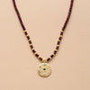 Collar De Cuentas Con Un Colgante De Oro Visión Bijoux